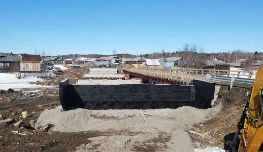 В Онежском районе продолжается ремонт моста через Тамицу